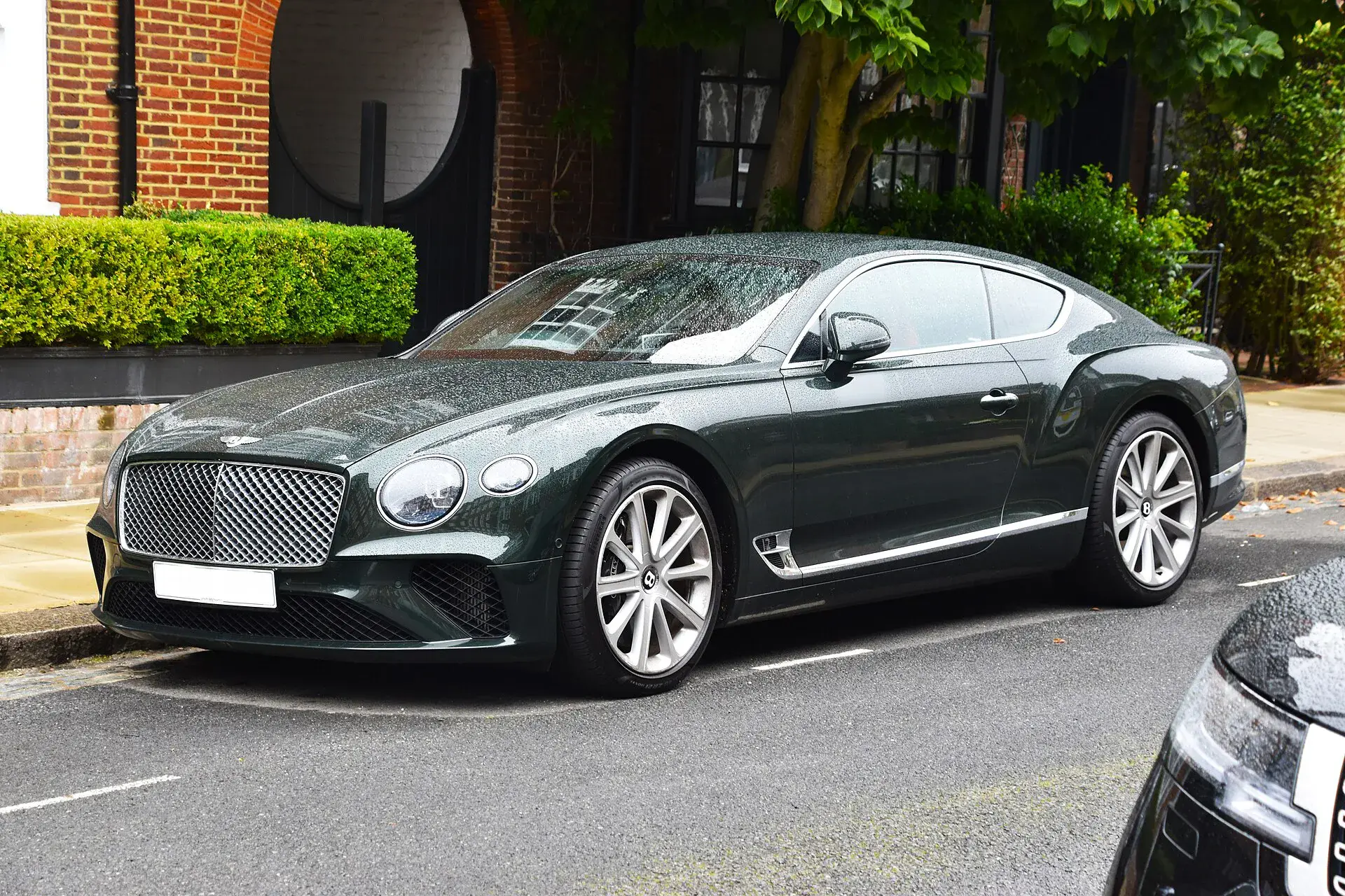 Front three-quarter view in British Racing Green